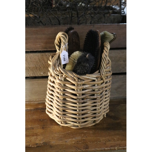 Cane basket of brushes, basket
