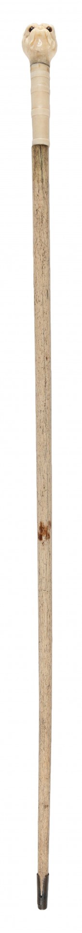 CANE WITH HANDLE CARVED AS THE