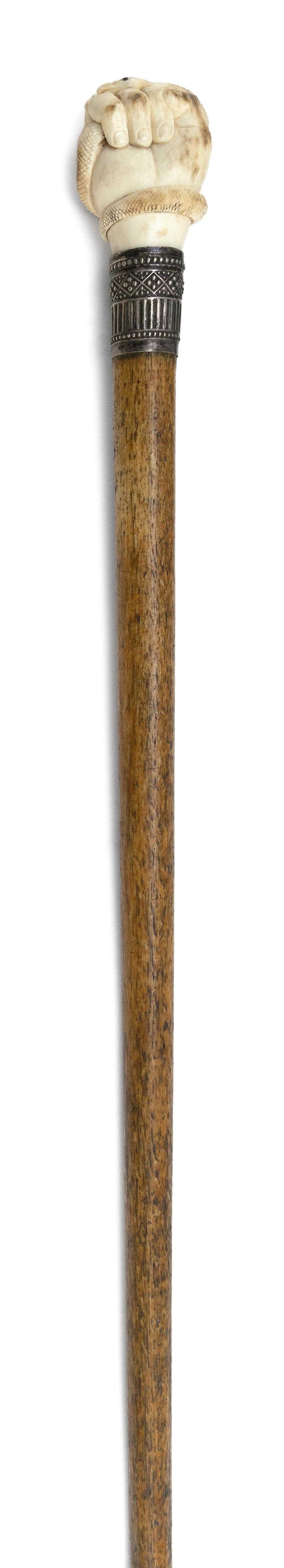 CANE WITH WHALE IVORY HANDLE IN THE