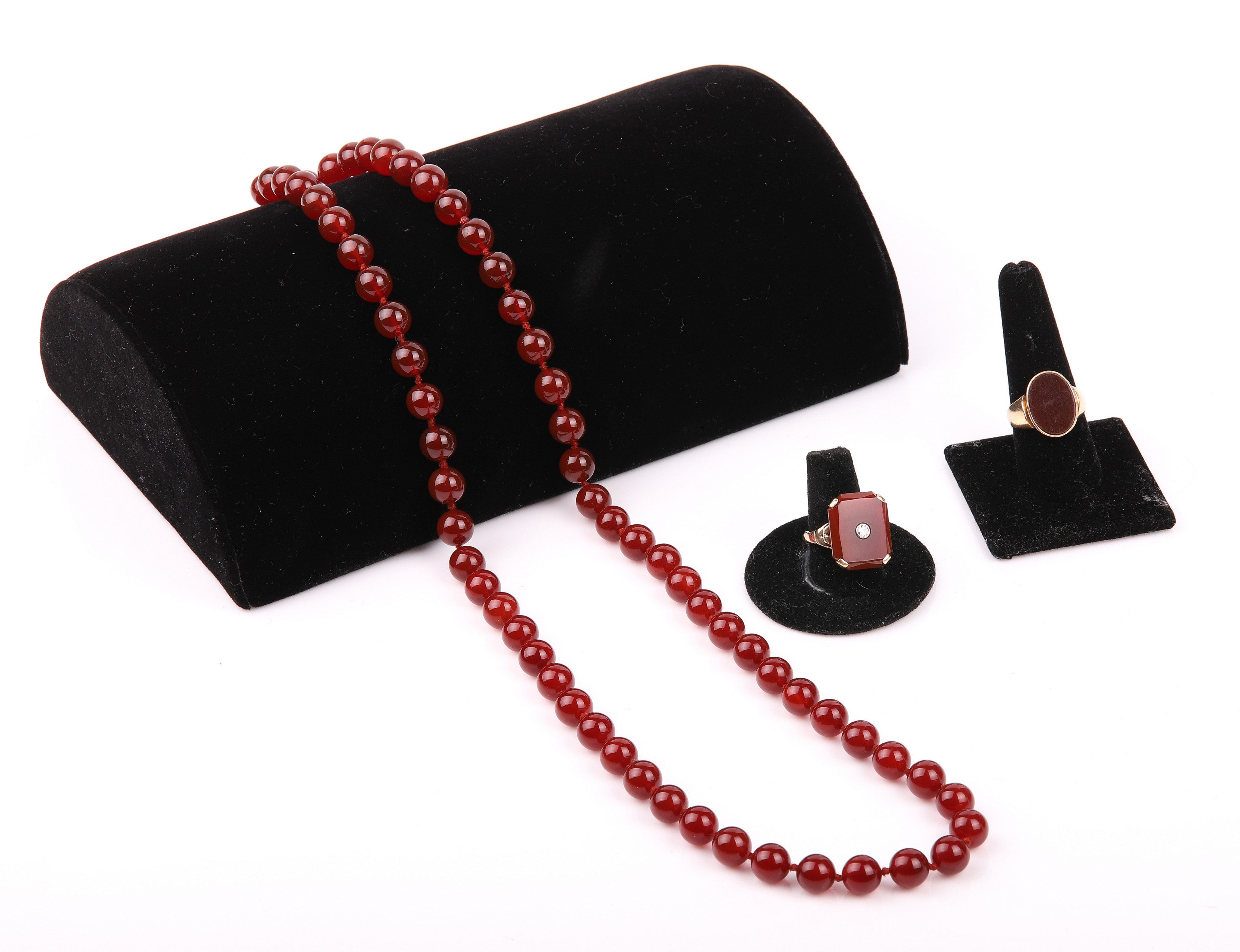 Carnelian necklace and (2) rings to