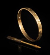 CARTIER 18 KT. YELLOW GOLD LOV