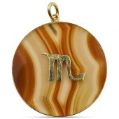 CARTIER 18K GOLD AND AGATE VIR