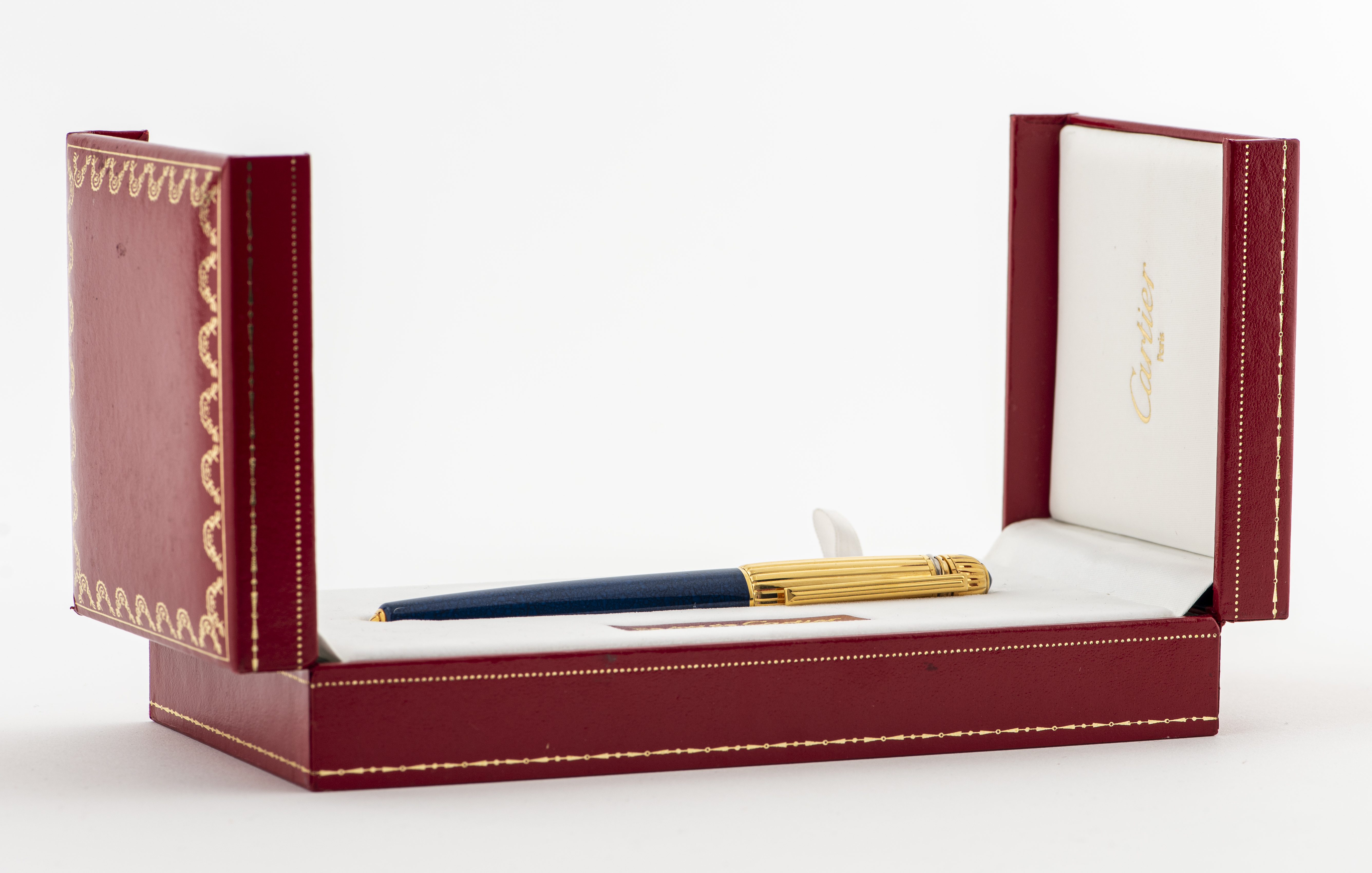 CARTIER 'PASHA' GOLD PLATE & BLUE