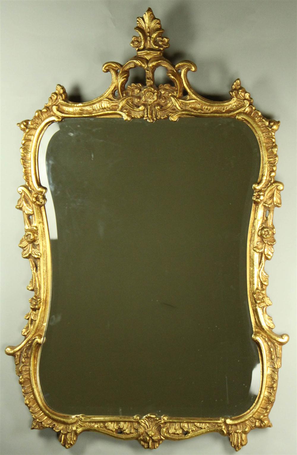 CARTOUCHE MIRROR SURROUNDED BY