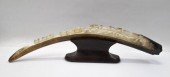 CARVED ALASKAN FOSSILIZED MAST