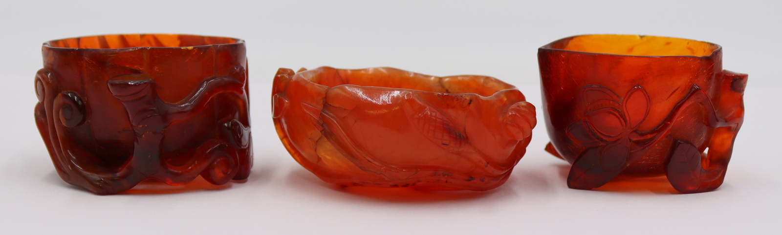 CARVED AMBER AND CARNELIAN WATER