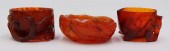 CARVED AMBER AND CARNELIAN WAT
