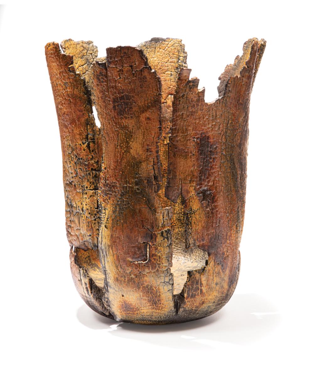 CARVED AND CHARRED WOOD VESSEL BY