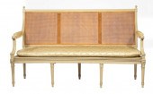 CARVED AND CRèME PEINTE SETTEE