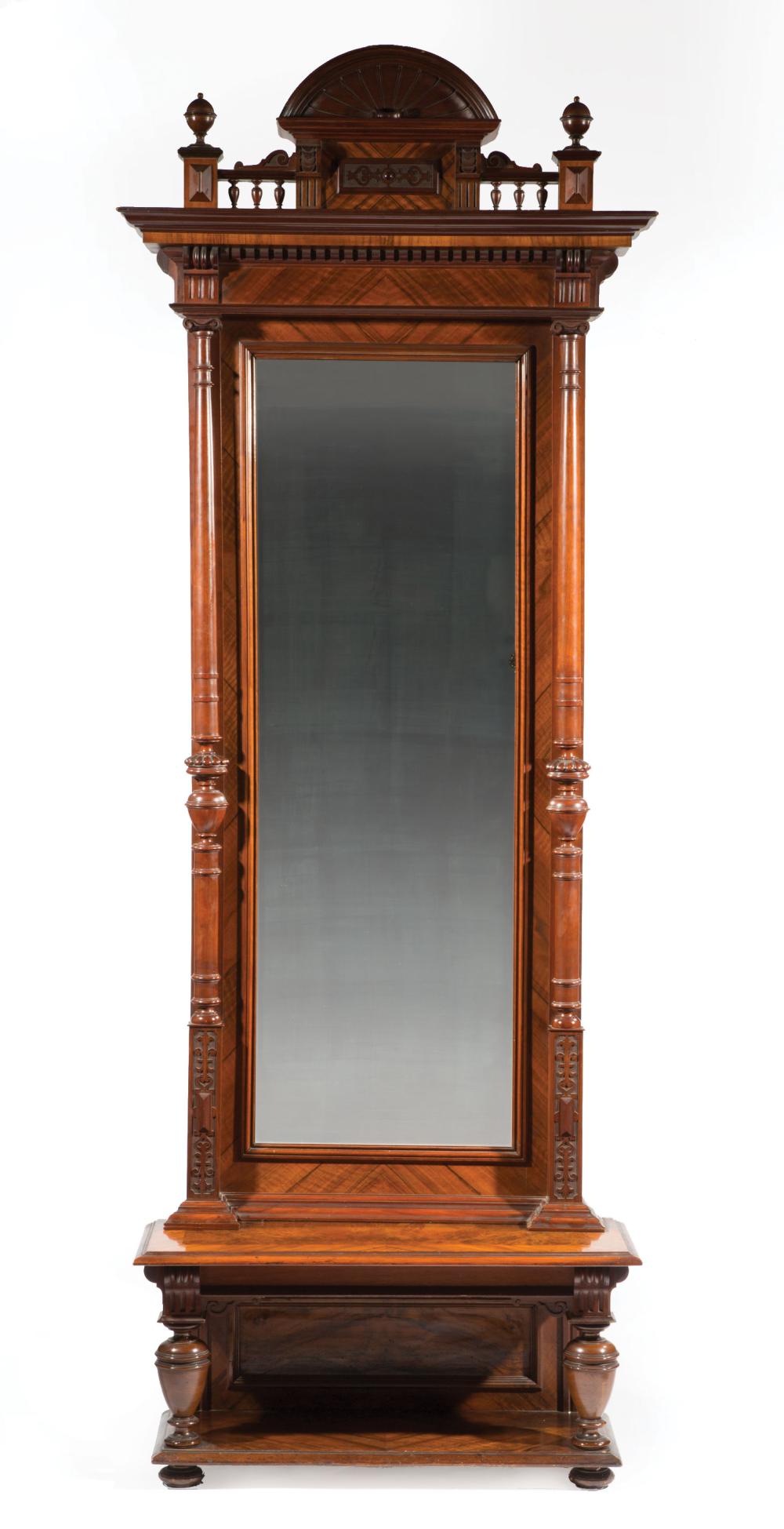 CARVED AND FIGURED WALNUT PIER