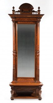 CARVED AND FIGURED WALNUT PIER