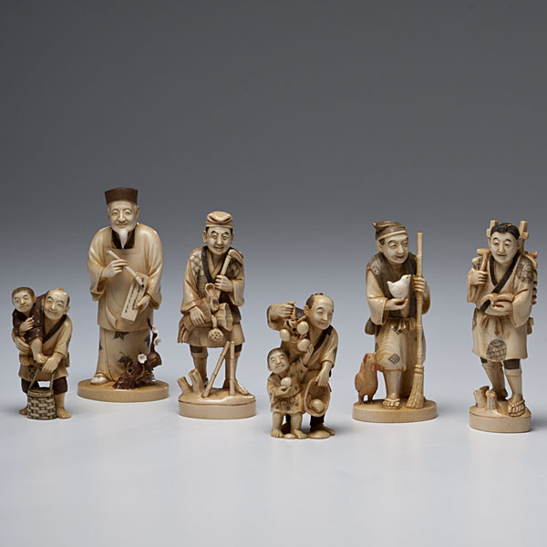 Carved and Inked Ivory Figures