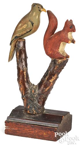 CARVED AND PAINTED BIRD AND