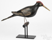 CARVED AND PAINTED BIRD ON PER