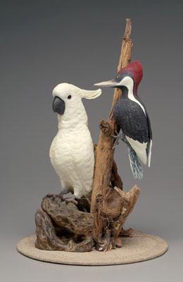 Carved and painted birds:
