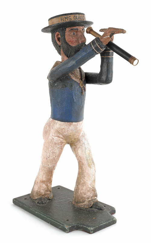 Carved and painted figure of a