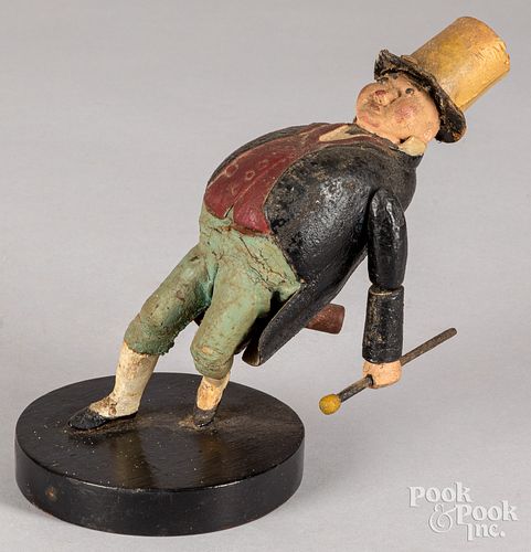 CARVED AND PAINTED FIGURE OF A