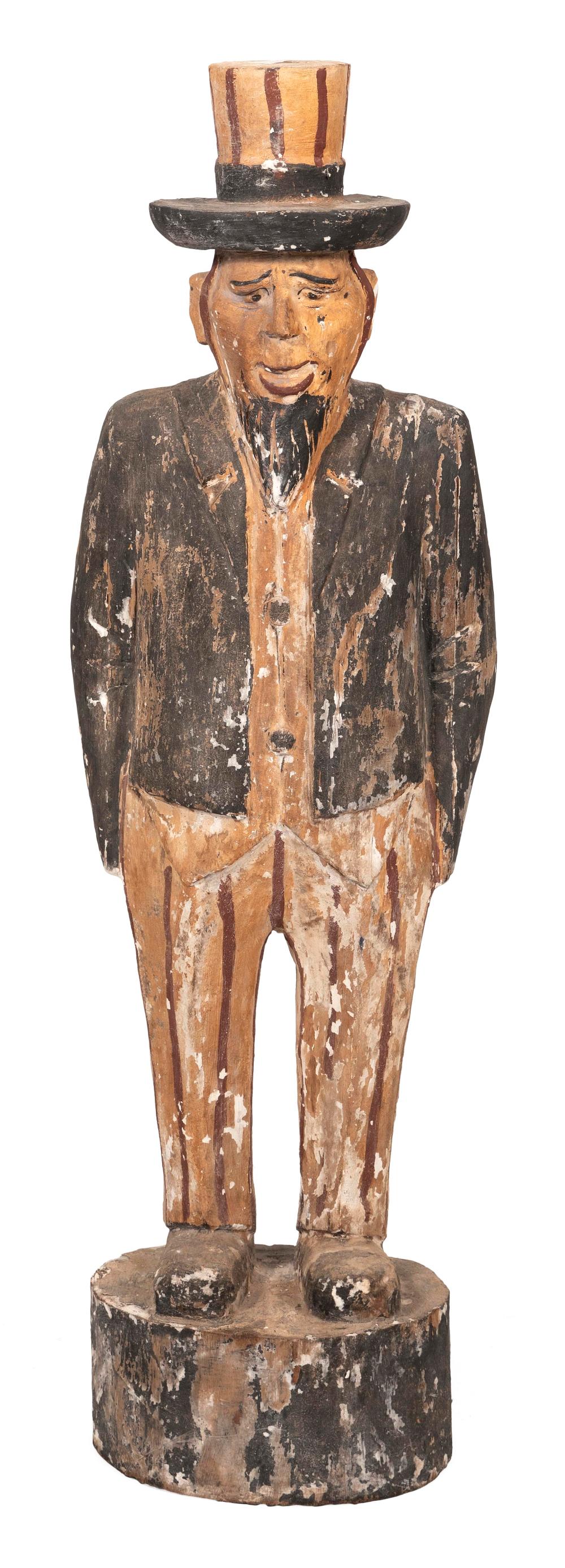 CARVED AND PAINTED FIGURE OF