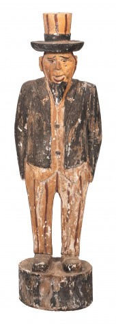 CARVED AND PAINTED FIGURE OF U