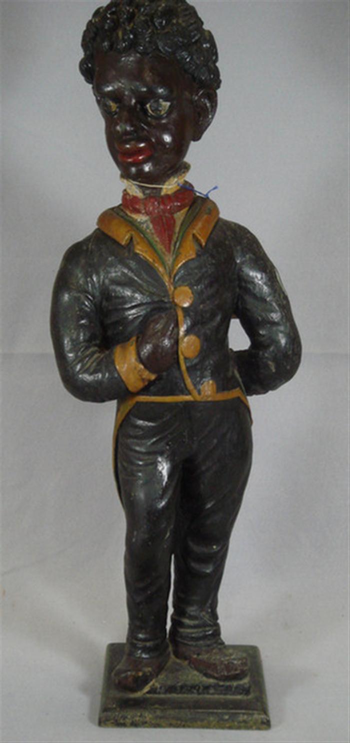 Carved and painted figure of a