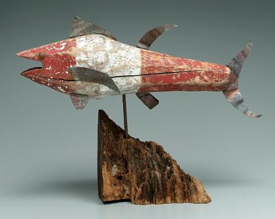 Carved and painted fish, old red