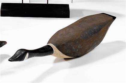Carved and painted hissing Canada