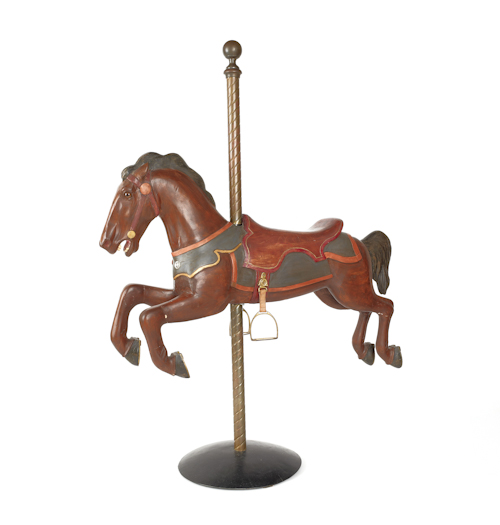 Carved and painted pine carousel
