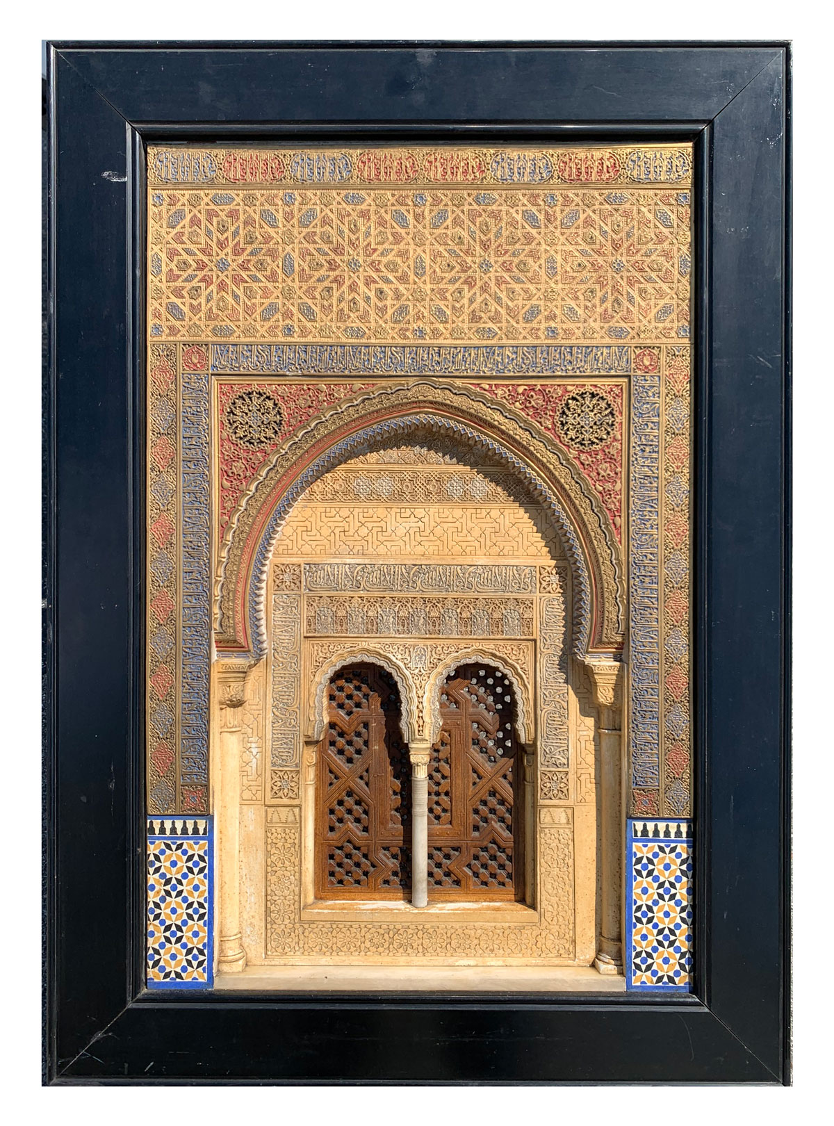 CARVED AND PAINTED PLASTER PLAQUE