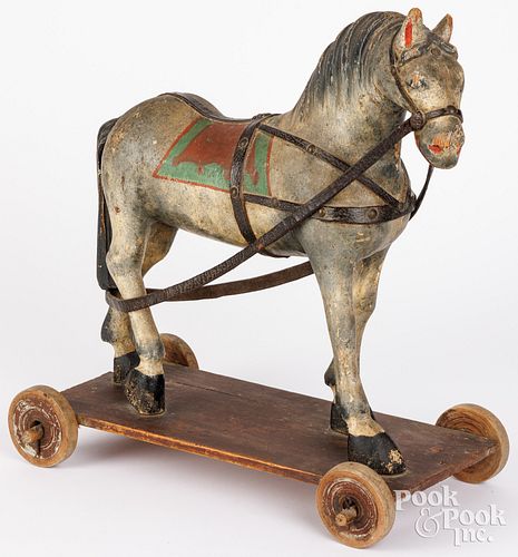CARVED AND PAINTED PLATFORM HORSE