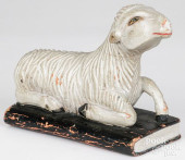 CARVED AND PAINTED RECUMBENT L