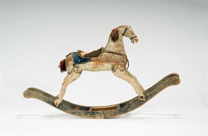Carved and painted rocking horse