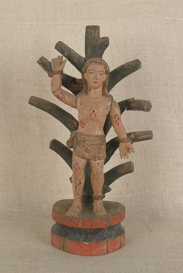 Carved and painted Santos 20th c.