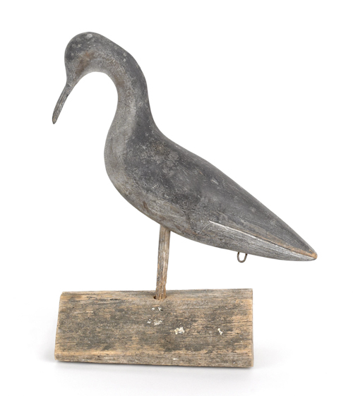 Carved and painted shore bird decoy