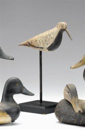     	Carved and painted shoreb