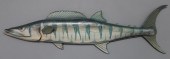 Carved and painted wahoo signe