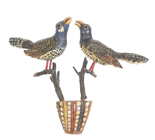 Carved and painted wall mount of