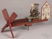 CARVED AND PAINTED WHIRLIGIG,