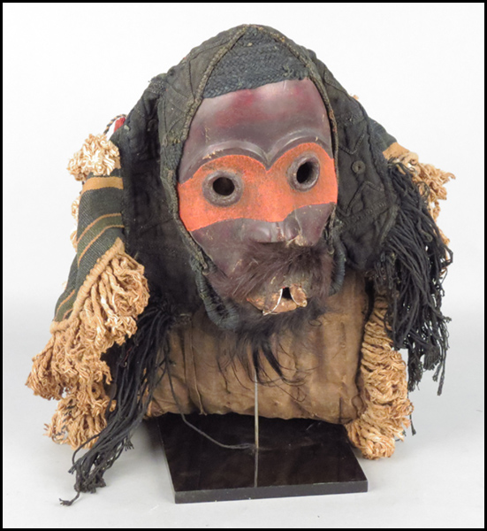CARVED AND PAINTED WOOD MASK.