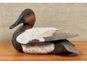 Carved and painted wooden duck,