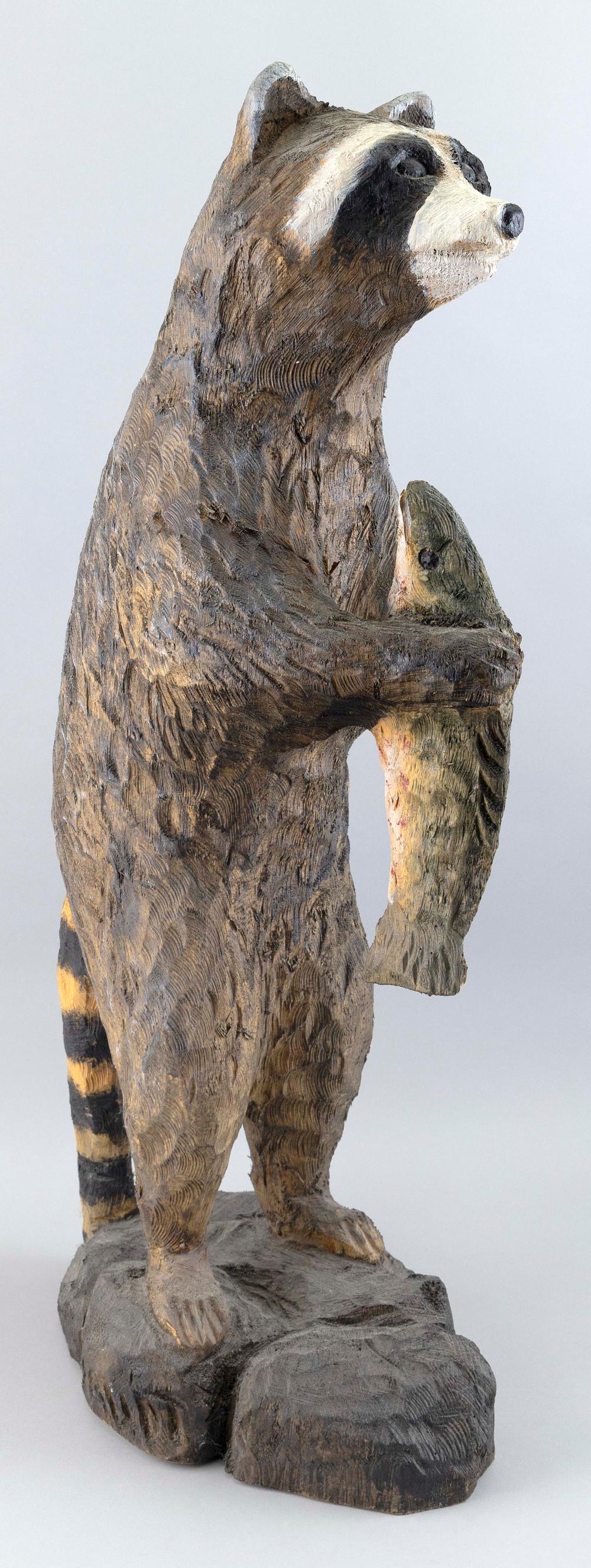 CARVED AND PAINTED WOODEN RACCOON
