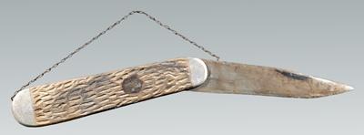 Carved and painted wooden sign,