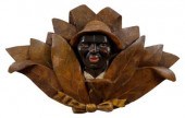 Carved and polychromed tobacco