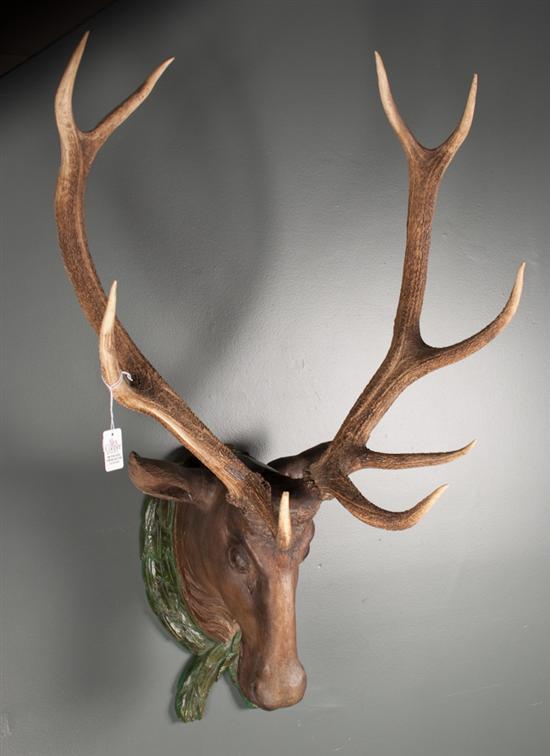 Carved and polychromed wood elk