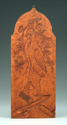 Carved bird's-eye maple breadboard,