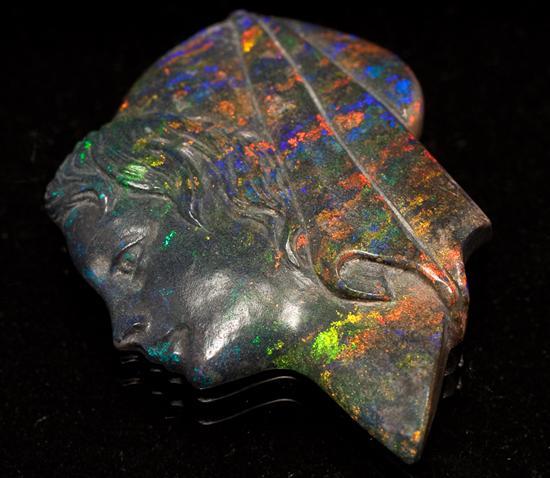 Carved black opal cameo