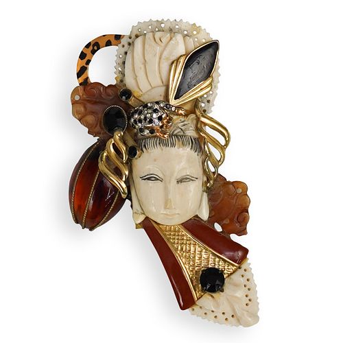 CARVED BONE AND PRECIOUS STONE