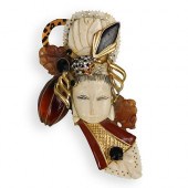 CARVED BONE AND PRECIOUS STONE