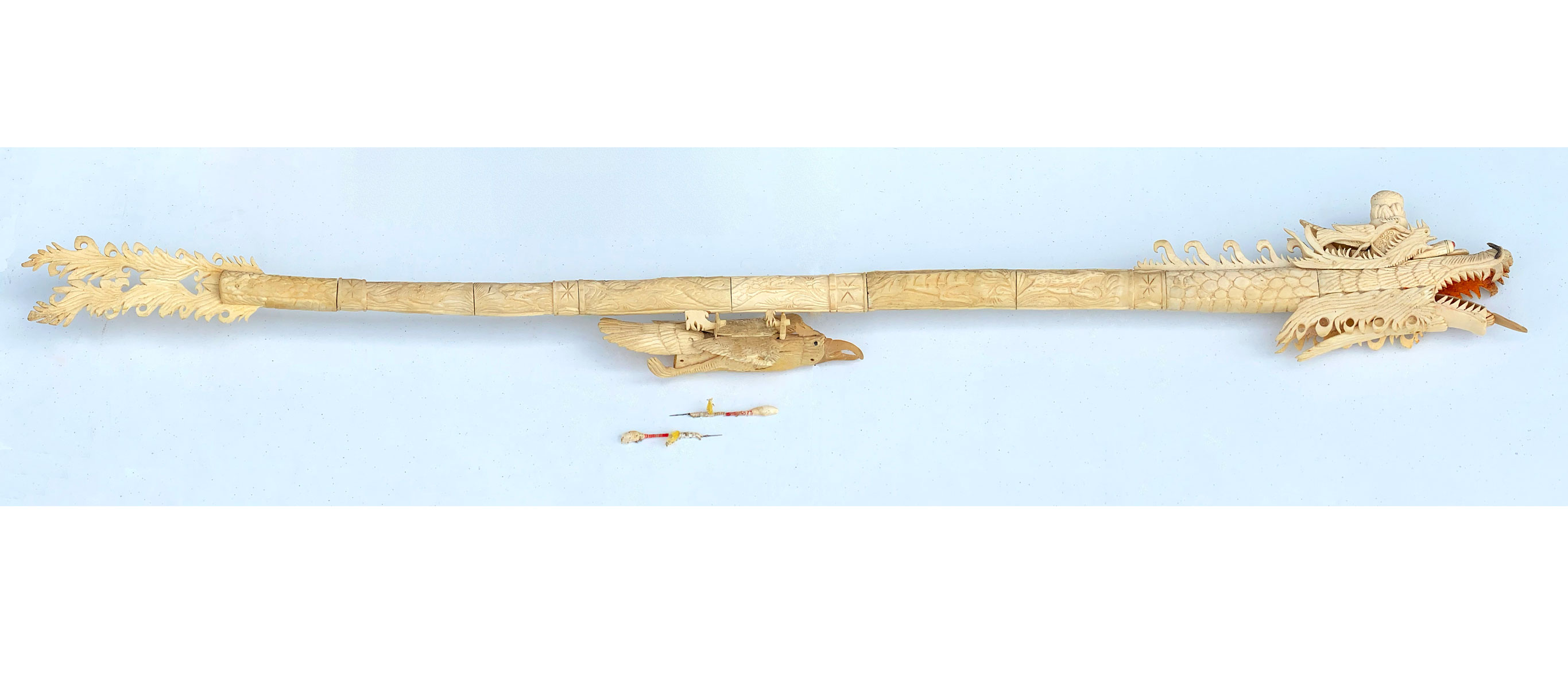 CARVED BONE DRAGON MOTIF BLOW GUN