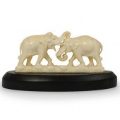 CARVED BONE FIGHTING ELEPHANTS