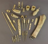 Carved bone objects, including